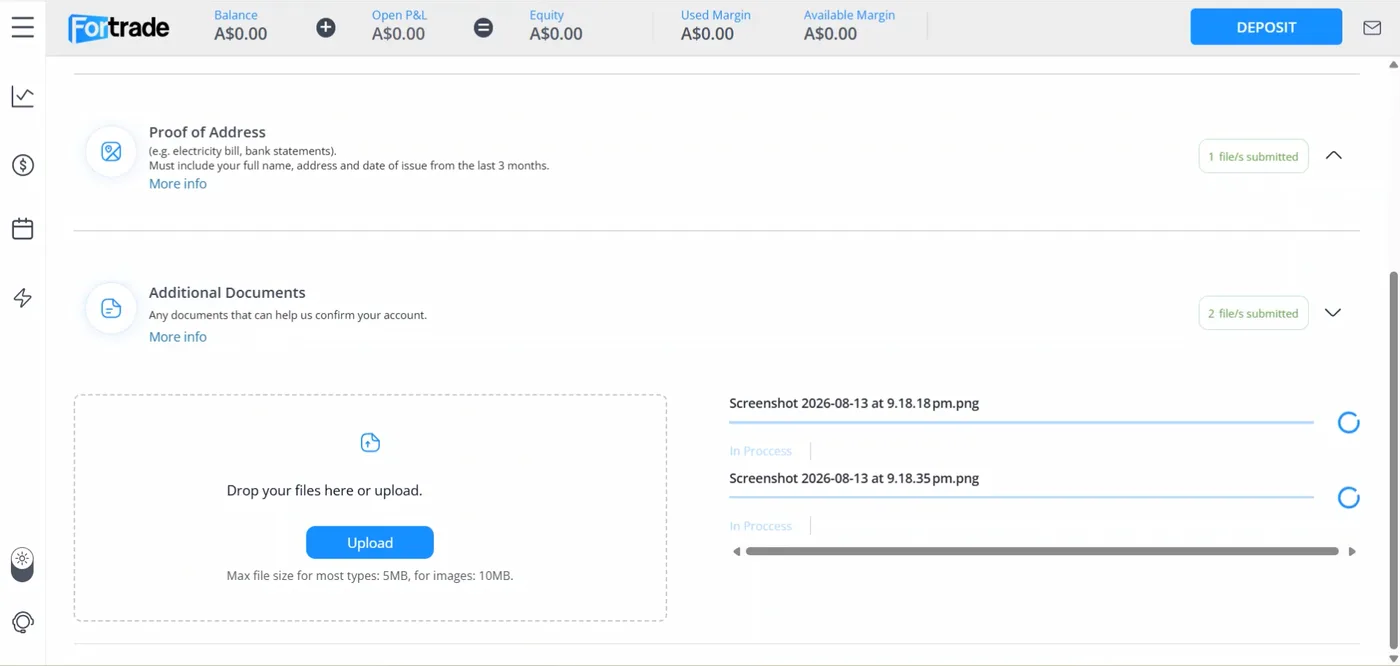 Upload Documents page showing one address file and two additional files submitted, each marked In Process with a spinning icon beside a drop files box.