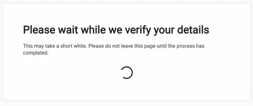 Waiting card with a spinner asking the applicant to stay on the page until verification completes.